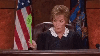 Judge Judy with a fly swatter